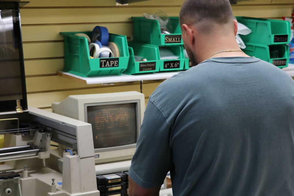 Daniel at the engraving controller setting up a job